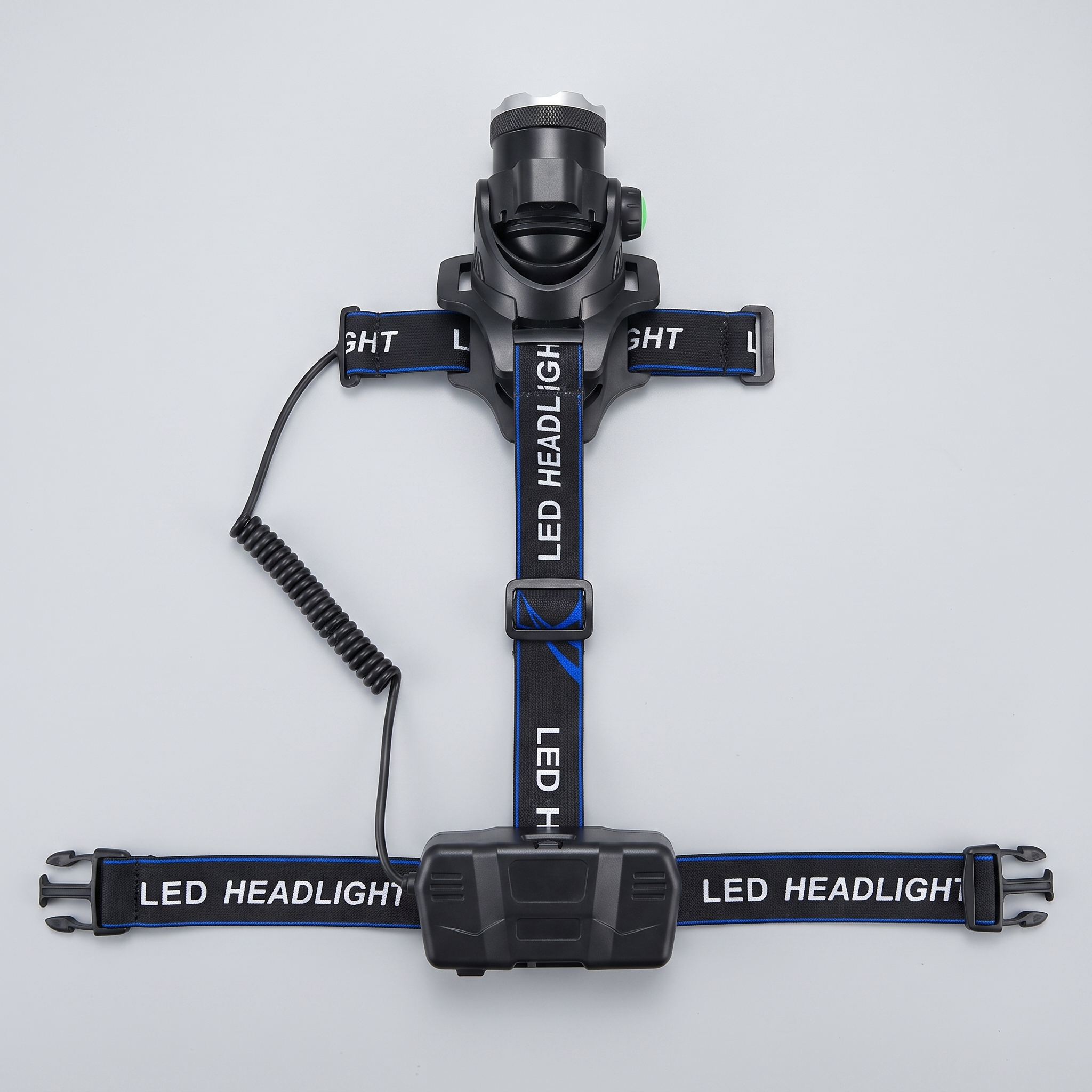 Head torch with the three-point harness opened out flat