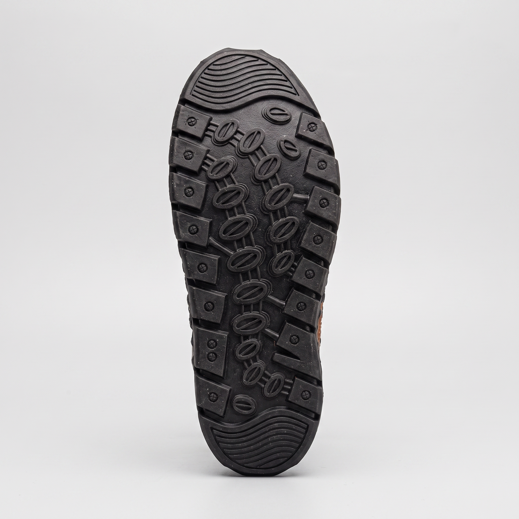 Rubber outsole tread pattern of the closed-toe sandal