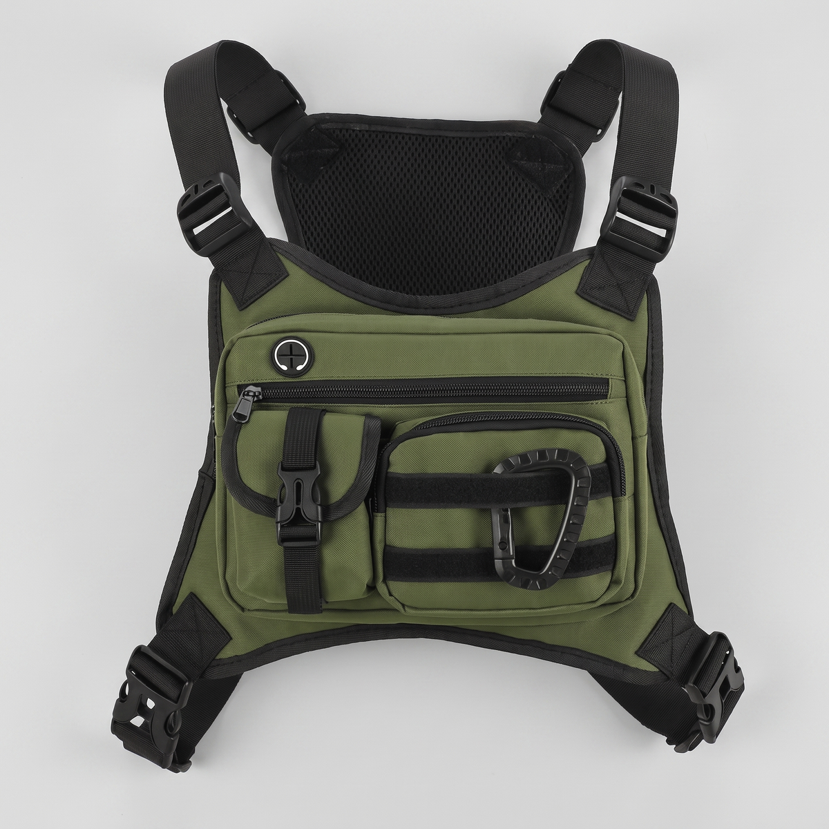 Men's tactical chest bag in olive, flat lay with harness