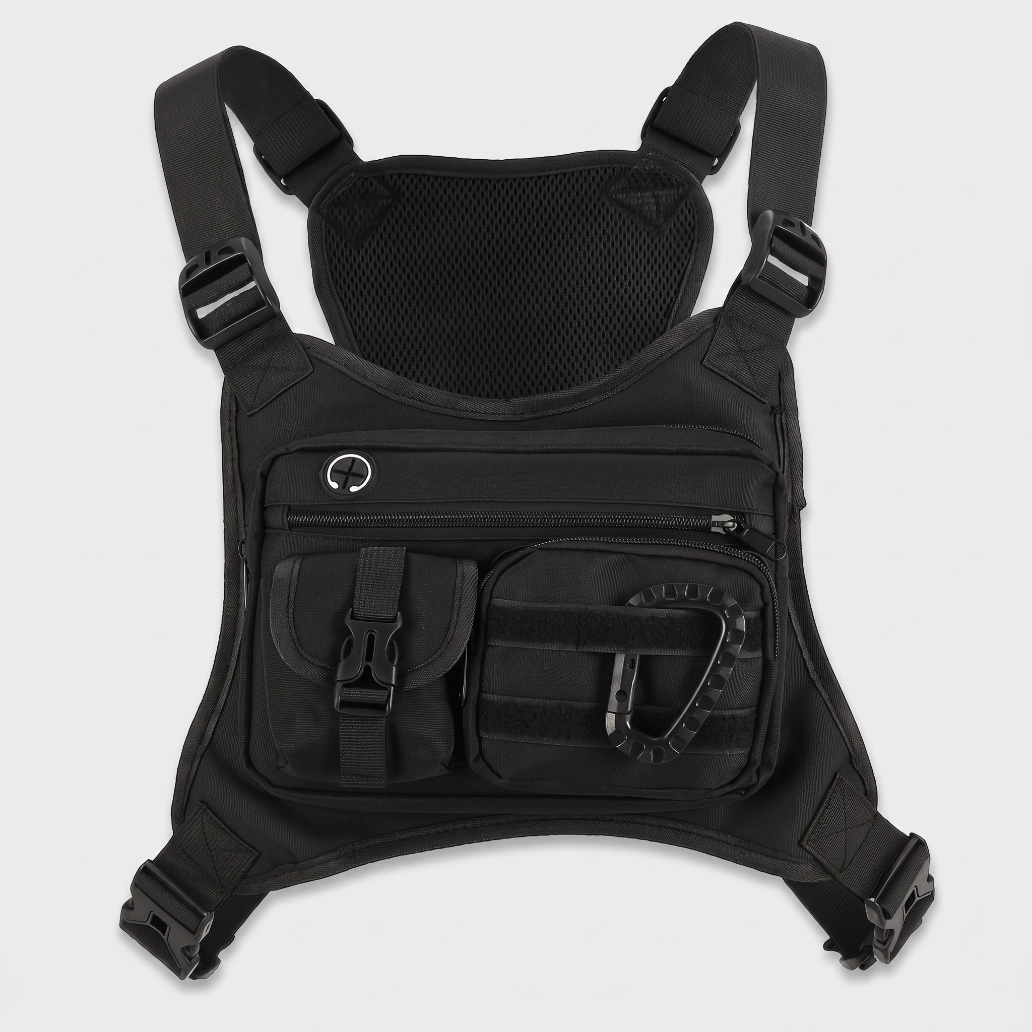 Men's tactical chest bag in black, flat lay with harness