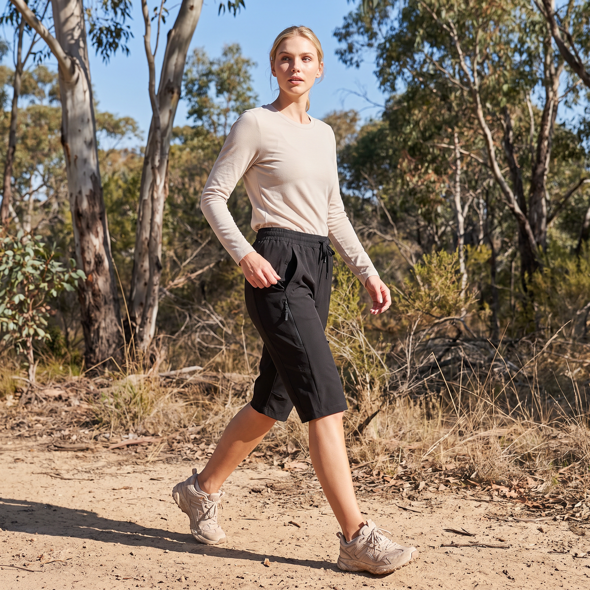 Walking a bush track, reaching for the zipped thigh pocket