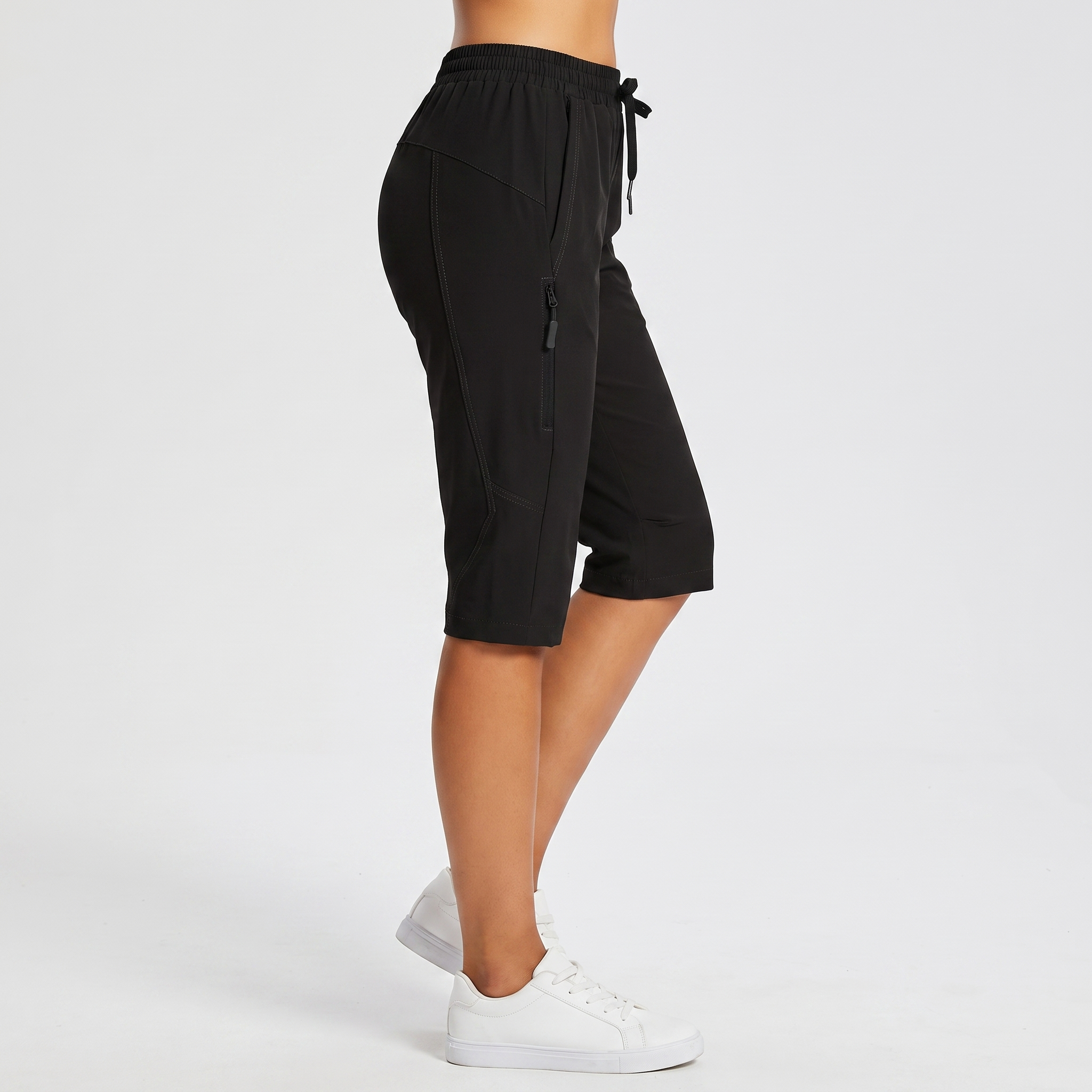 Side view showing the hem finishing at the knee